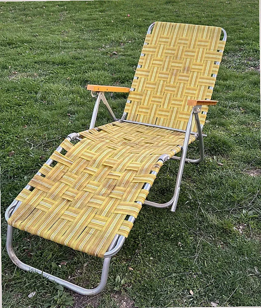 Vintage retro aluminum chaise lounger webbed yellow